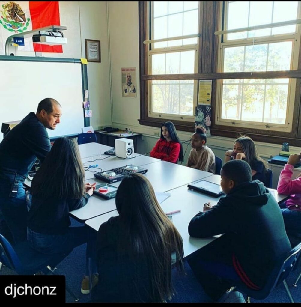 DJ Chonz teaching students