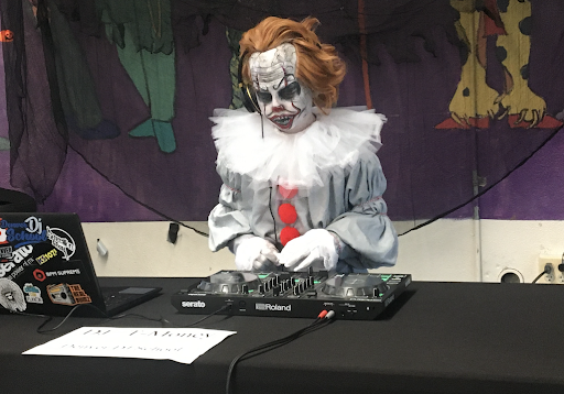 DJ dressed in clown costume