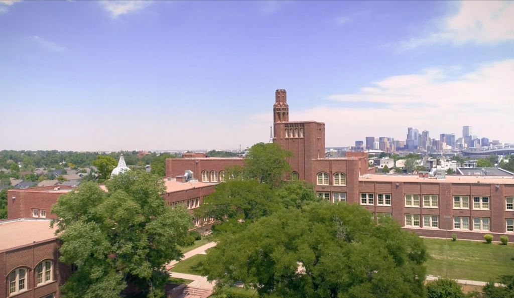 Aerial shot of Lake building with downtown Denver Skyline