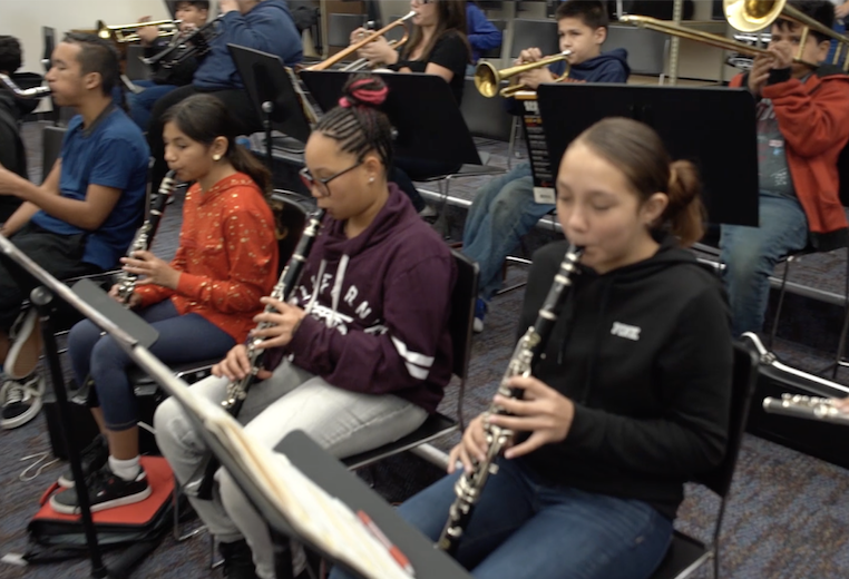 Students playing instruments